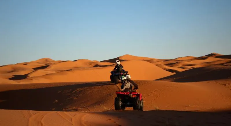 Quad bike in the Sahara dunes on 4 Days Tangier to Marrakech Desert Tour
